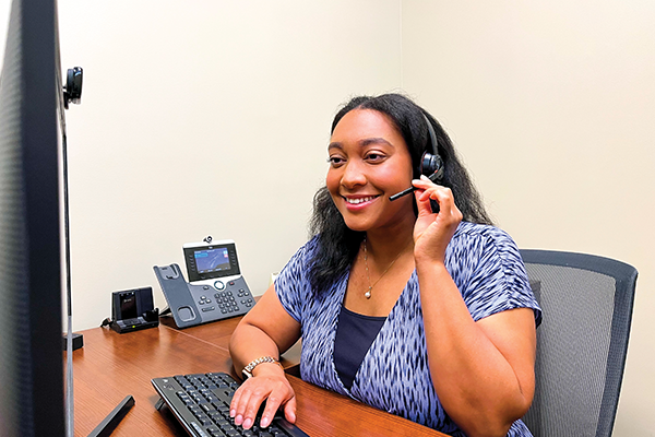 Member Services helping member on phone