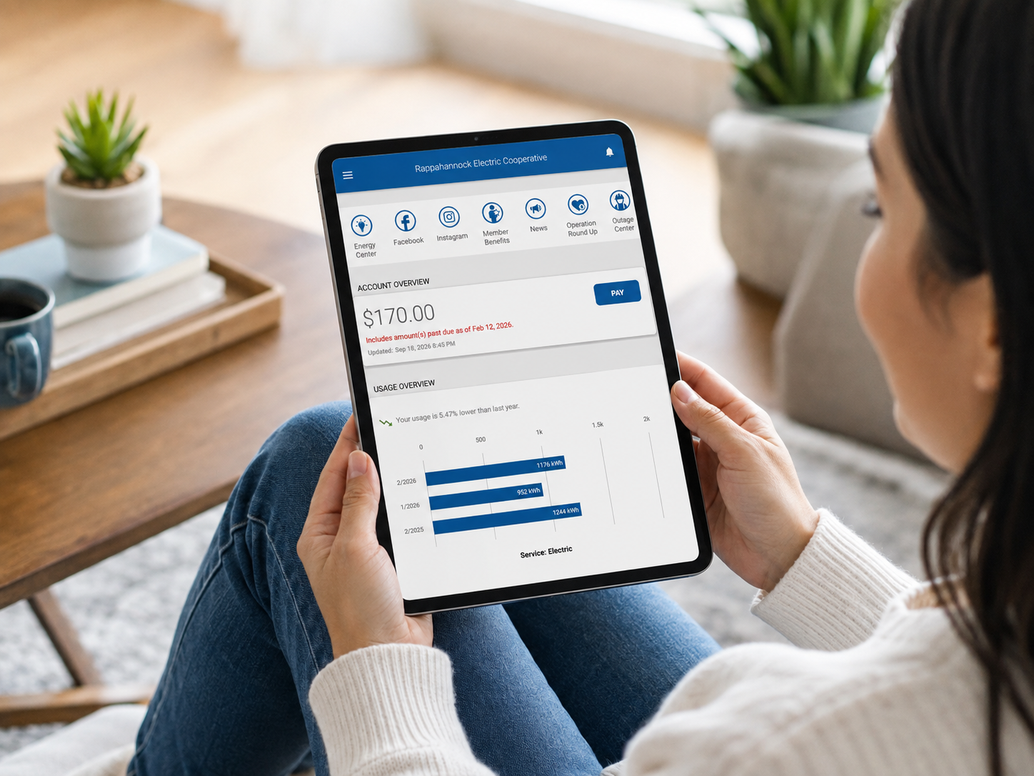 Member using MyREC SmartHub on a tablet