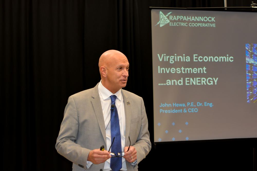 Photo of John Hewa, President & CEO of REC